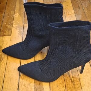 Sleek Black Knit Pointed-Toe Ankle Booties